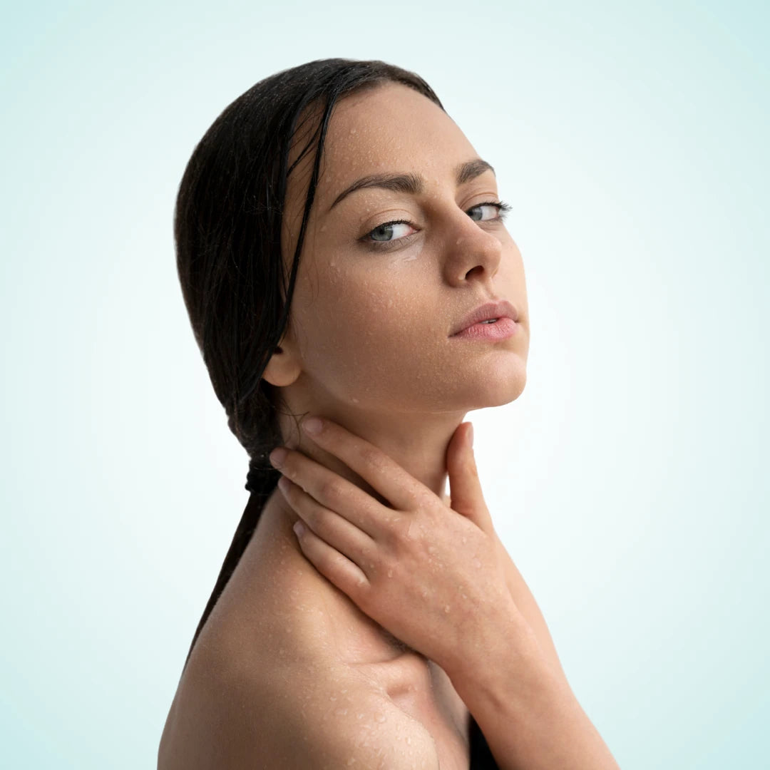 Close-up of woman post-shower using Soaporize Ritual Kit – natural treatment for armpit odor and long-term body odor cure